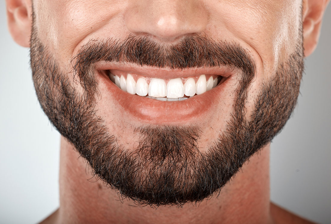 Closeup male model face with clean smile